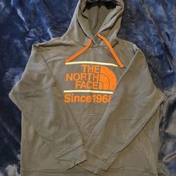 The North Face hoodie in a unique green and orange colourway