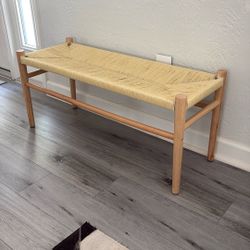 Wood bench with wicker seat on good condition in Palmetto Bay area
