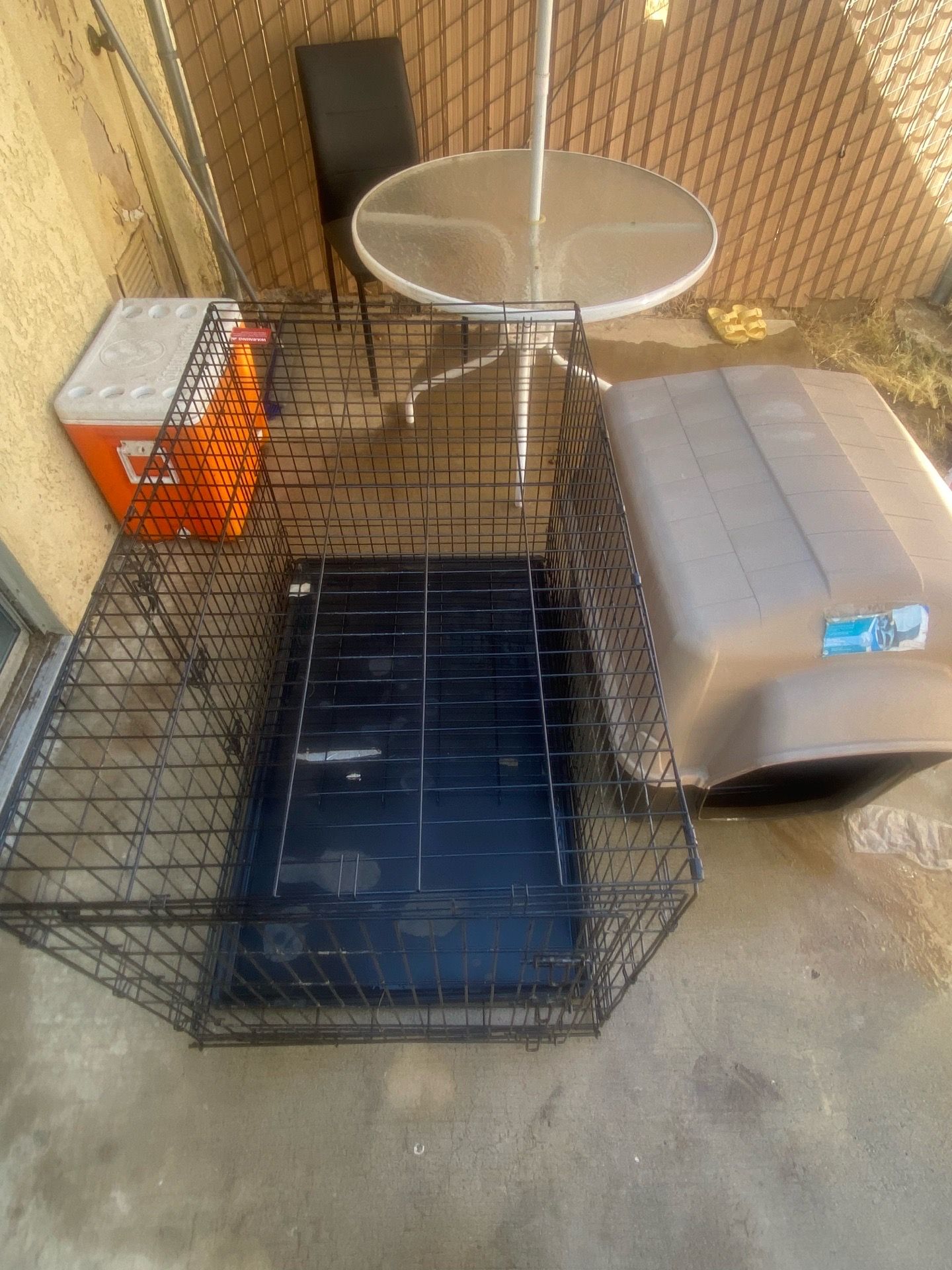 Huge dog kennel along with dog house $50