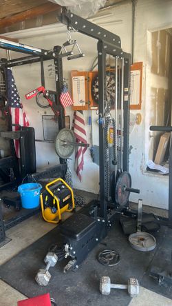 Power rack with storage lap pull down