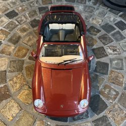 Diecast Porche Carrera 911 by Burago