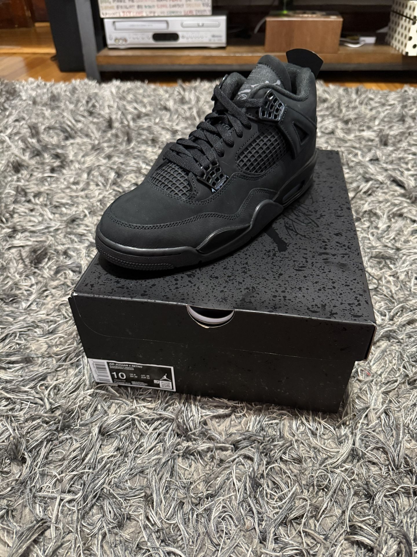 Black Cat Jordan 4s