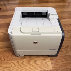 HP laser jet P2055dn laser printer With toner USB cable