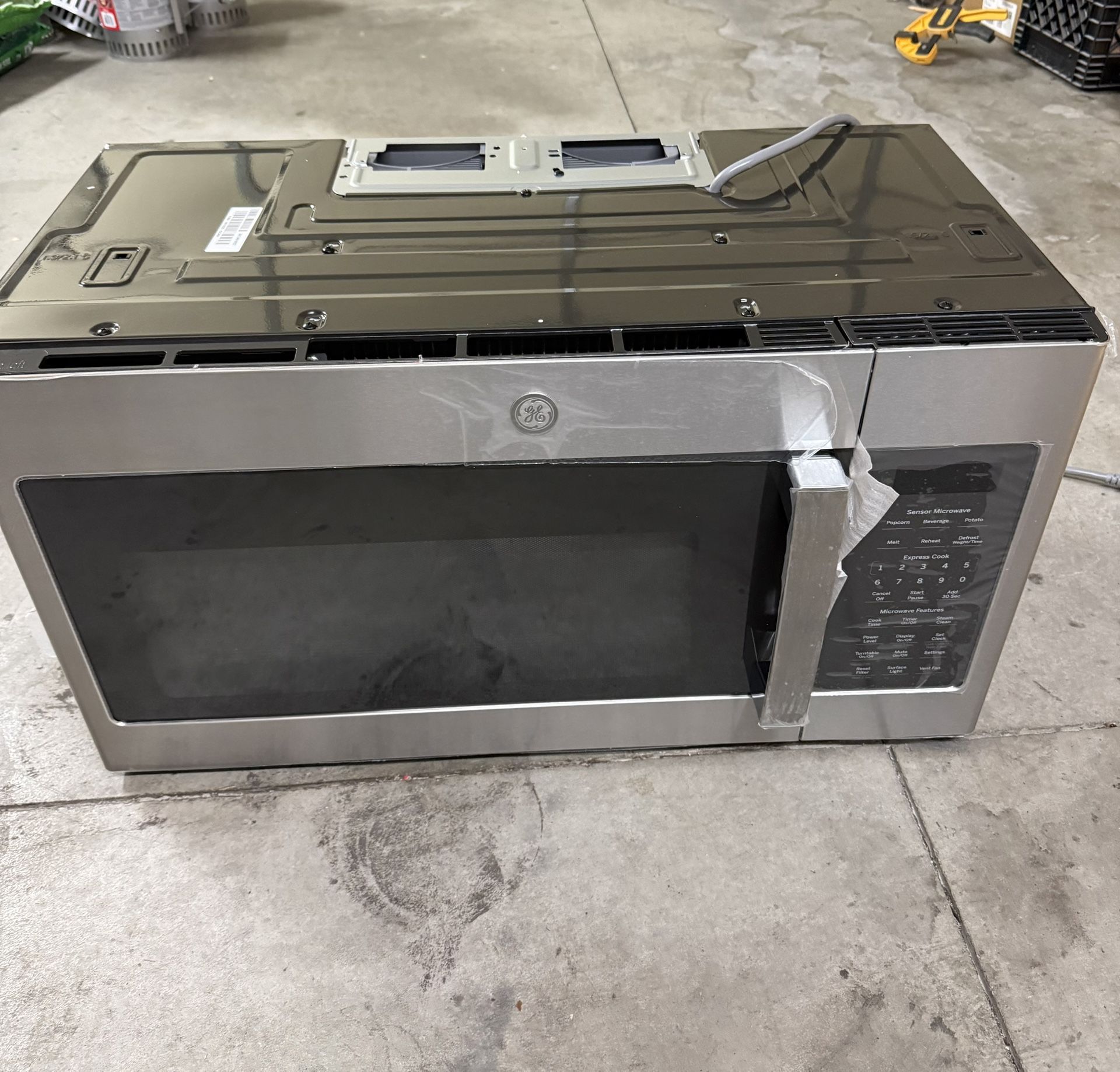 GE 1.9 cu. ft. Over-the-Range Microwave in Stainless Steel with Sensor Cooking Store SKU# 1003-118-816