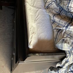 Almost new changing table with cushion