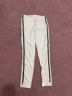 Slim-fit white ivory stretchy cigarette pants f with side zippers.stretch fabric for comfort Clean design ideal for casual wear or dressung up No size