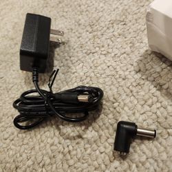 Puimit AC/DC ADAPTER.