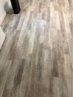 2 boxes of CORELUXE luxury vinyl plank flooring in French Alps Spruce (6mm with attached pad).