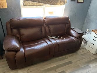 Small Couch for office, Leather, Electric decline capability.