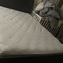 Queen size bed with dresser and and side table