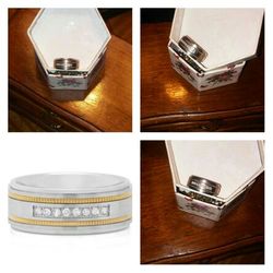 Mens 1/7 https://offerup.com/redirect/?o=Y3QudHc=. Diamond Two Toned Stainless Steel band/Ring