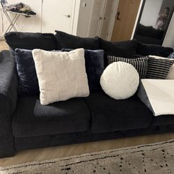 black 3-seater sofa.