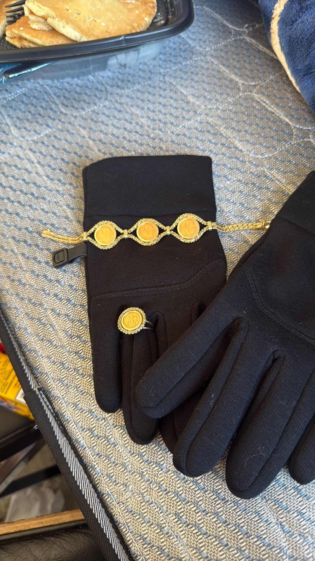 Bracelet and ring bracelet is 14 K ring is 14 K coins are 22K