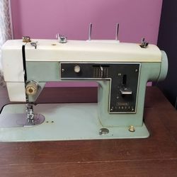 Vintage Kenmore sewing machine with table