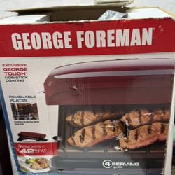 George Foreman red grill for 4 servings with removable plates.