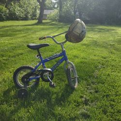 Child's Bike with helmet and training wheels 
