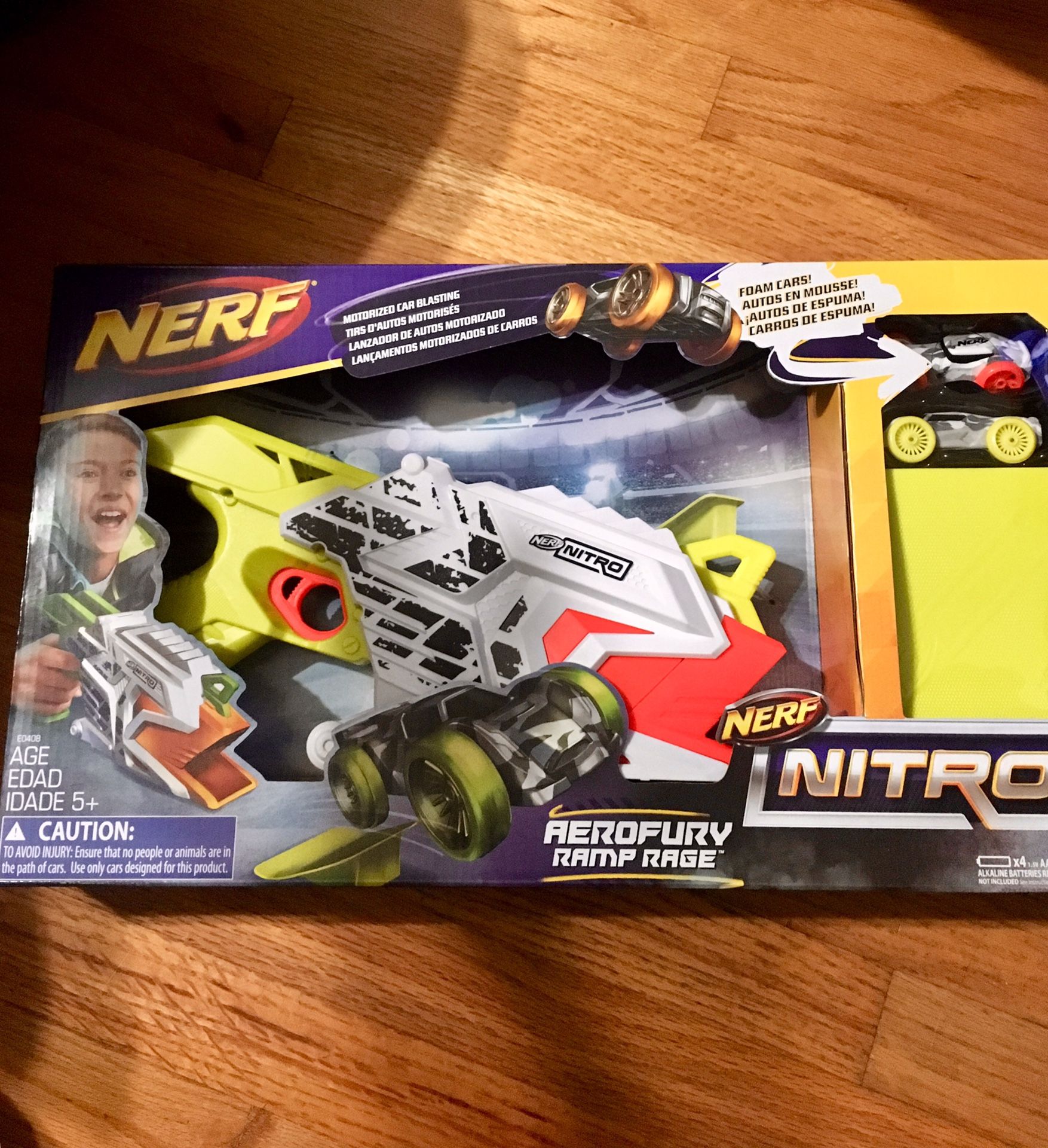 Nerf nitro gun and 2 nerf cars