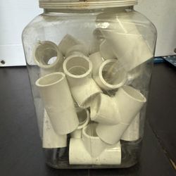 PVC pipe fittings, including elbows and connectors