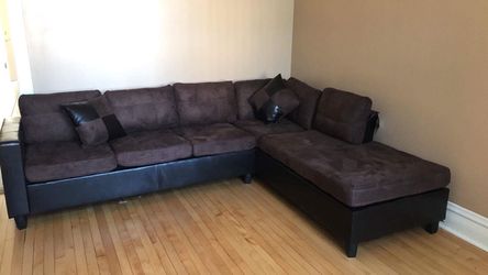 Brand new chocolate brown sectional. Reversible chaise