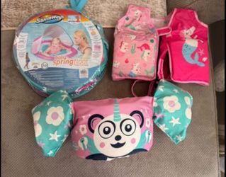 Baby girl pool floaty and safety vests