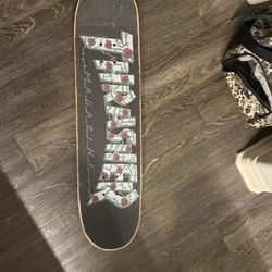 Santa Cruz Skateboard w/ Thrasher Grip Tape