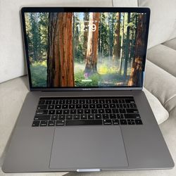 2018 Apple MacBook Pro 15.4" Intel i9 2.9 GHz/Radeon Pro 560X Video Card - 32GB RAM/1TB SSD