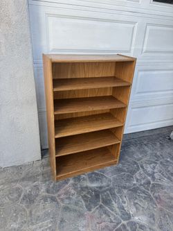 Traditional 5- layer shelf bookcase . Average condition . measurements :12 deep x 30 W x 48H. 