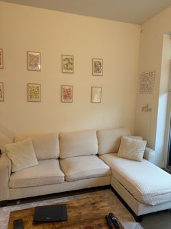 Beige L shaped sectional couch