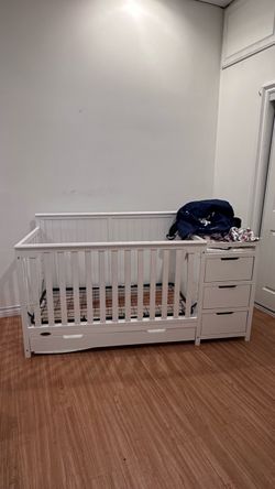 Crib with changing table
