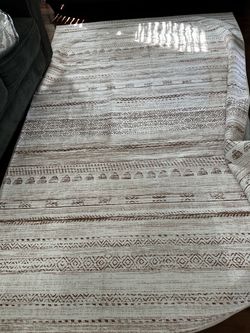 Cream and Brown Tribal Pattern Area Rug