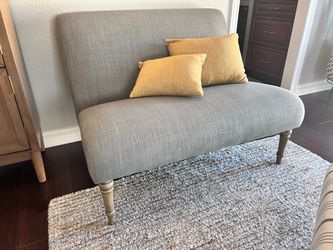 Gray Upholstered Settee with Turned Legs