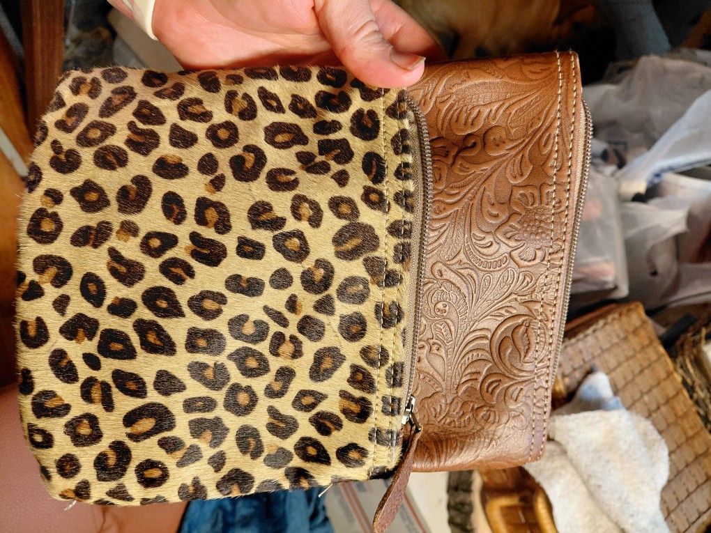 Myra Bag cowhide and leather crossbody purse with a leopard print hair-on hide front pouch and a brown embossed leather main compartment.