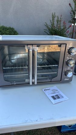 Brand New Oster French Door countertop Oven