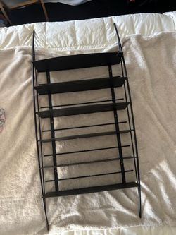 Black metal wall shelf Black metal wall shelf