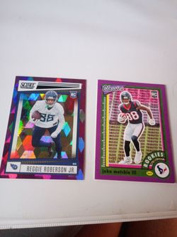 2 football cards (both rookie and numbered cards)
