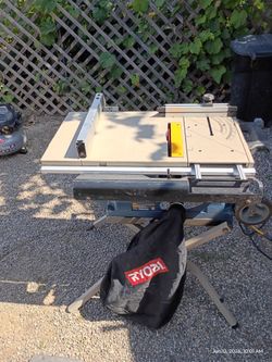 Ryobi table saw 10" with built in rolling stand