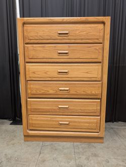 Golden Oak Six-Drawer Dresser with Wooden Pulls