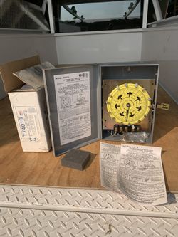 Electric timer new in box never used. Extra stock list new for 150