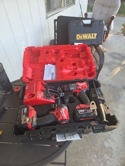 M18 FUEL 18V Lithium-Ion Brushless Cordless Hammer Drill and Impact Driver Combo Kit (2-Tool) with 2 Batteries STORE PRICE $ 399$