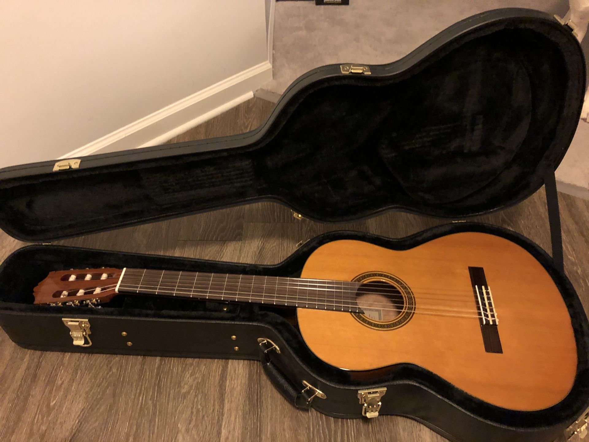 Yamaha cg111c classical guitar never used comes with hard case and electric tuner