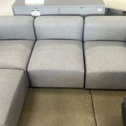 3 Seater And Ottoman Grey Sofa