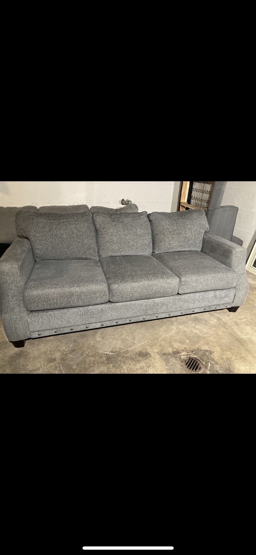 Dark grey studded 3 seat Broyhill sofa