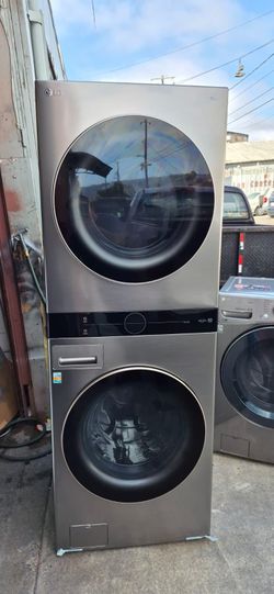 Wash Tower Stacjet SMART Laundry Center 4.5. cu ft. Front Load Washer & 7.4 cu. ft. Electric Dryer un Black Steel W/ Steam (Semi New)