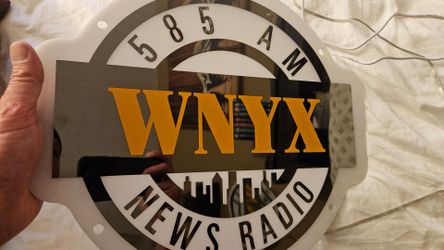 WNYX 585 AM NewsRadio Logo Sign