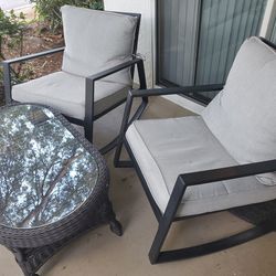 2 Outdoor Rocking Patio Chairs And Outdoor Glass Top Table