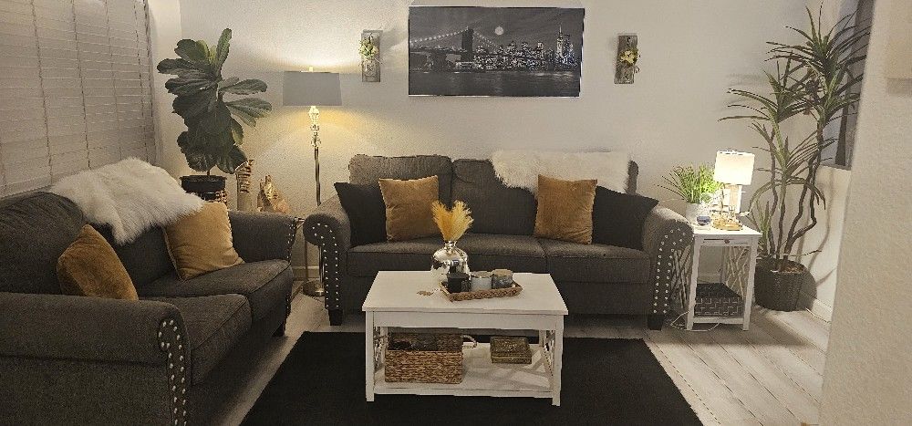 Couch and Loveseat With 2 White Tables