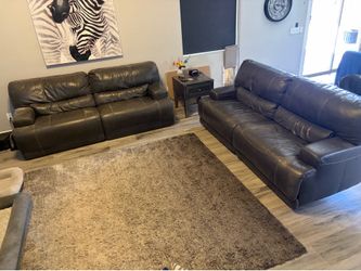 2 powered reclining sofas