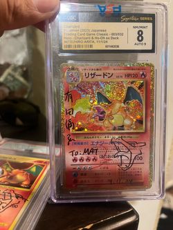 Signed charizard Pokemon card