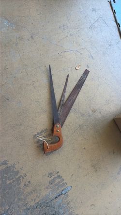 Vintage handheld three blade saw rusted very old