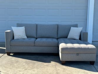 Free Delivery/ Sectional couch with storage by World Market